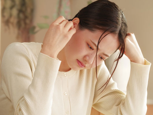 不調な女性イメージ